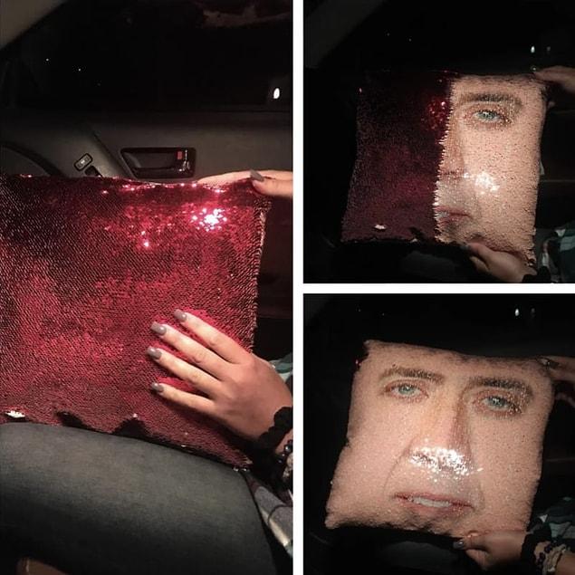 7. The girlfriend who has a brilliant Nicholas Cage pillow: