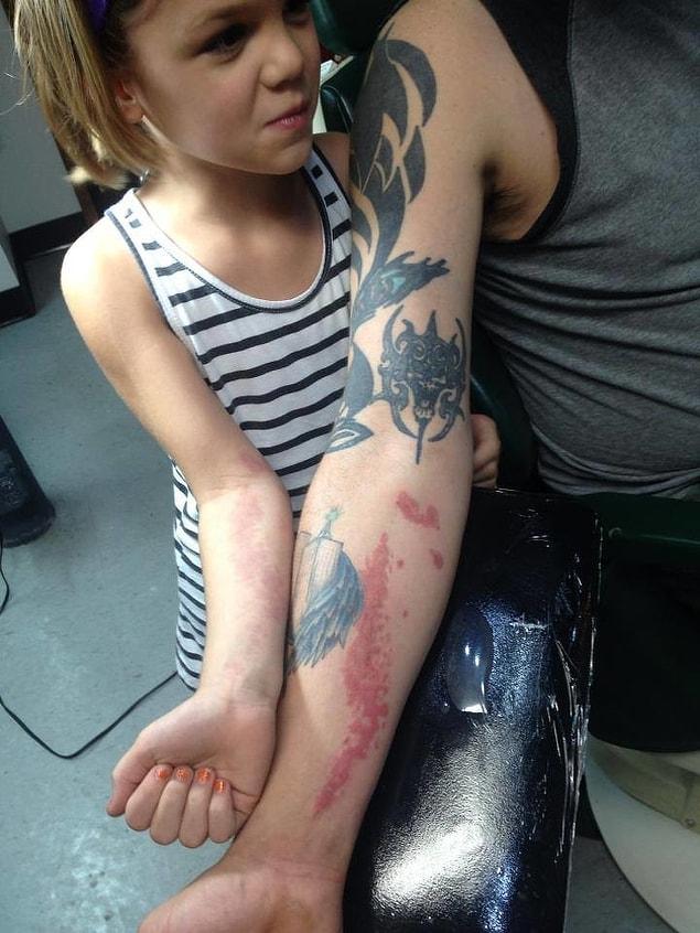 6. "My daughter was complaining about her birthmark, so I got a tattoo of it on my arm."