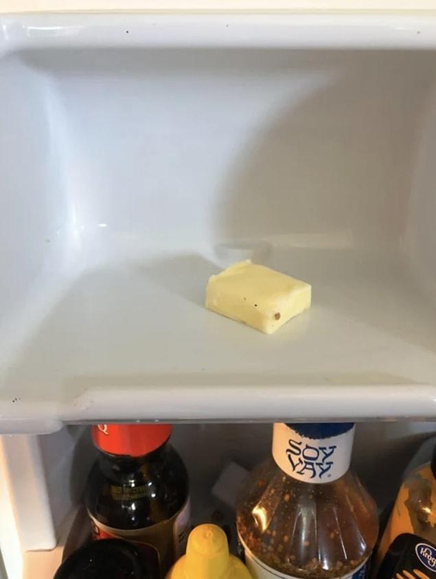 5. He thinks it is right to put the butter away in a dirty fridge like this...