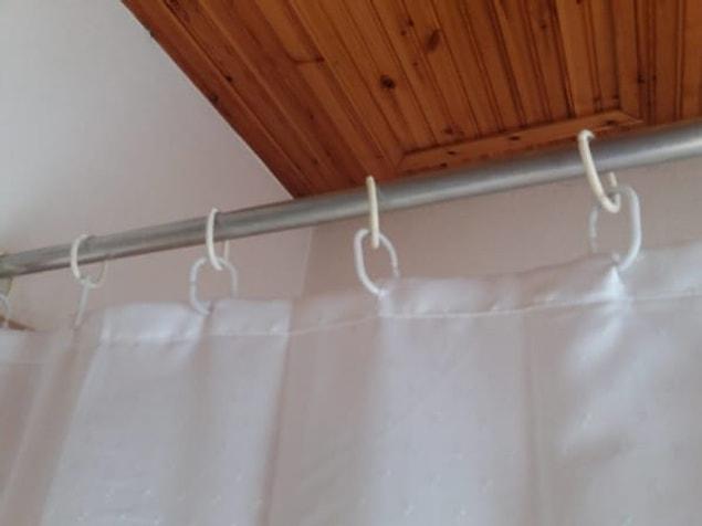 7. Extend your too-short-shower-curtain by adding more rings like that: