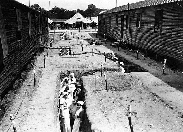 7. Nurses in their bomb trenches between hospital wards, France, 1918
