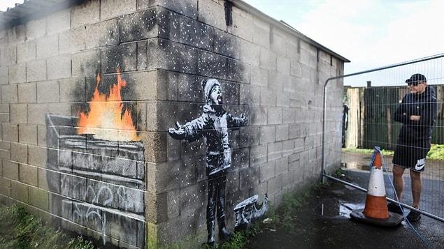 Banksy posted a video showing the graffiti with the caption "Season's Greetings".