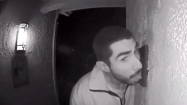 A man spent three hours licking a doorbell as a family slept inside and now police is searching for him.