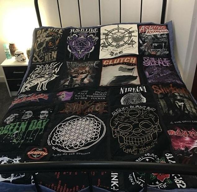 17. “Using an old curtain as the backing and a large collection of awesome band T’s, I made this quilt for a workmate.”