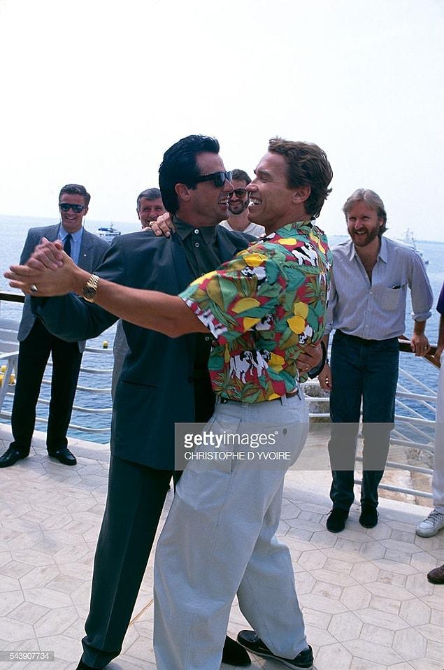 7. Sylvester Stallone and Arnold Schwarzenegger dancing at the Cannes Film Festival in 1991