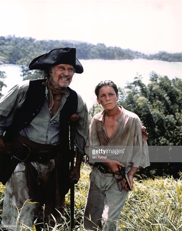 11. Christian Bale playing alongside Charlton Heston in the film Treasure Island in 1990