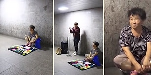 Önce İnsan Olmak Önemli: Yere Kurduğu Tezgahında Bir Şeyler Satmaya Çalışan Kadına Müzik Yaparak Destek Olan Güzel İnsan