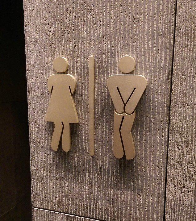 10. Çişini tutmaya çalışan kadın ve erkek figürlerinden oluşan tuvalet işaretleri: