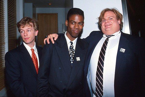 15. 29 Mart 1993'teki 65. Akademi Ödülleri sonrasında, Elton John AIDS Vakfı partisinde boy gösteren David Spade, Chris Rock ve Chris Farley.