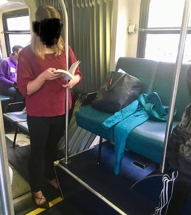 4. This woman, taking 2 seats without even using either of them.