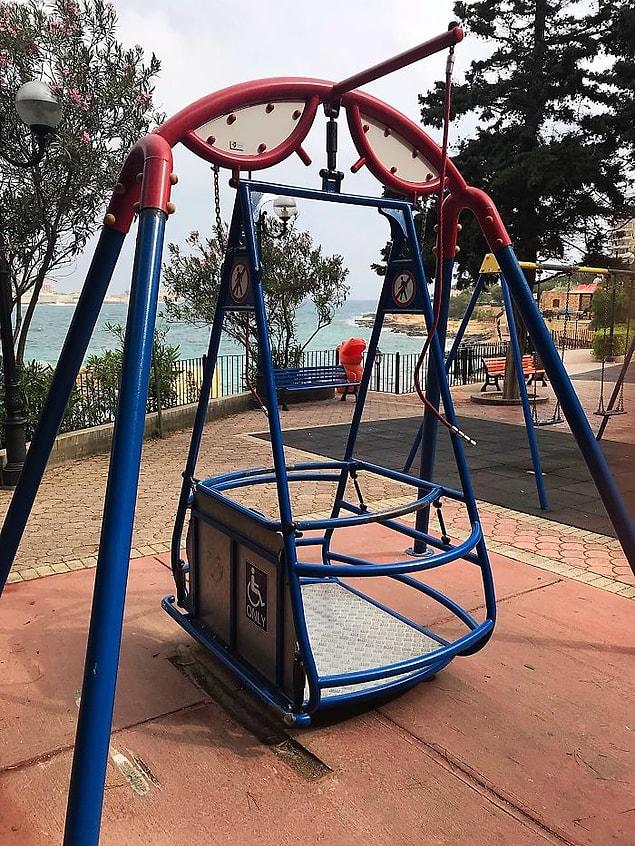 7. "This park has a swing for wheelchair users."