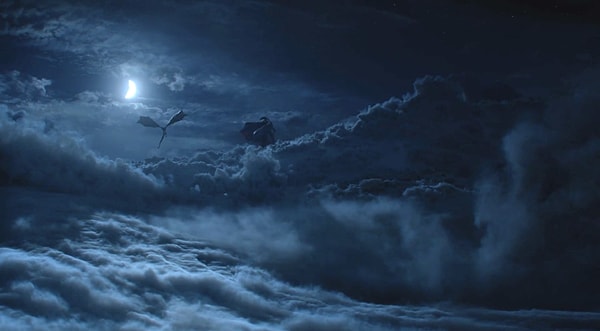 9. Дрогон и Рейгаль парят в ночном небе проигрывающего Винтерфелла