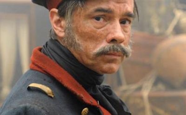 9. Сколько лет в романе было Максиму Максимычу?