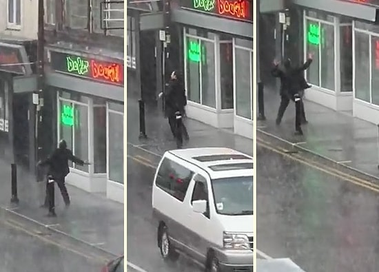 Yağmurun Altında Gönlünce Dans Eden Adam