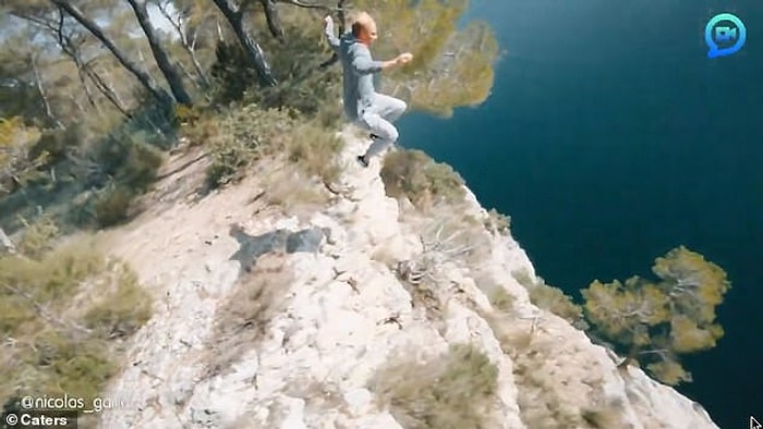 Metrelerce Yükseklikten Dağ Gölüne Atlayan Adamın Muhteşem Drone Görüntüleri!