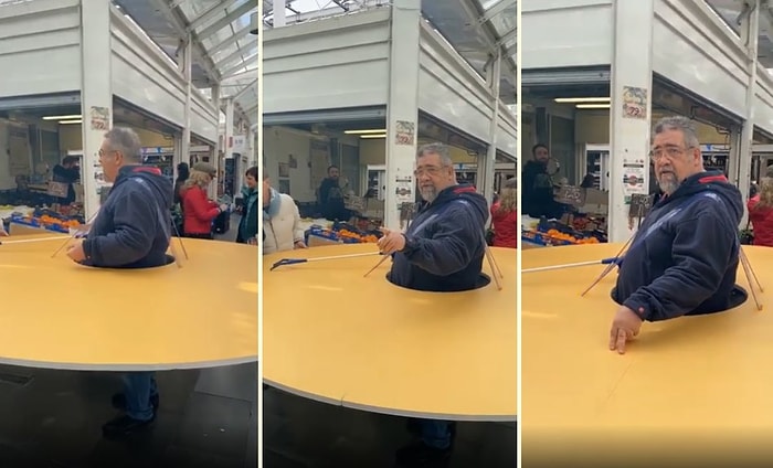 Koronavirüs Salgınından Korunmak İçin Ahşap Çember ile Dolaşan Adam