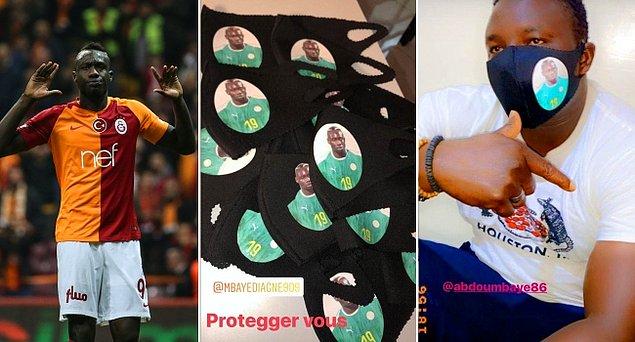 6. Diagne, ülkesi Senegal'e üzerinde kendi resminin olduğu maskelerden bağışladı.