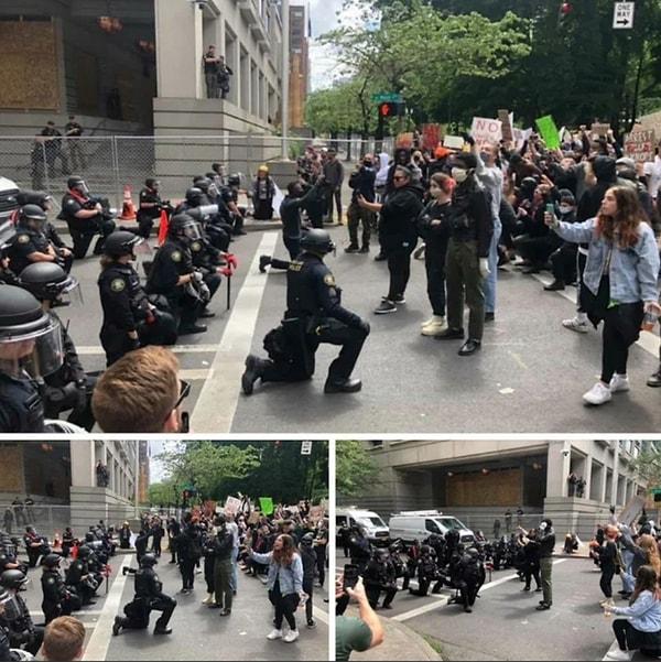 3. Portland, Oregon'da polisler, protestocuların hislerine saygı duyduklarını gösteriyorlar.