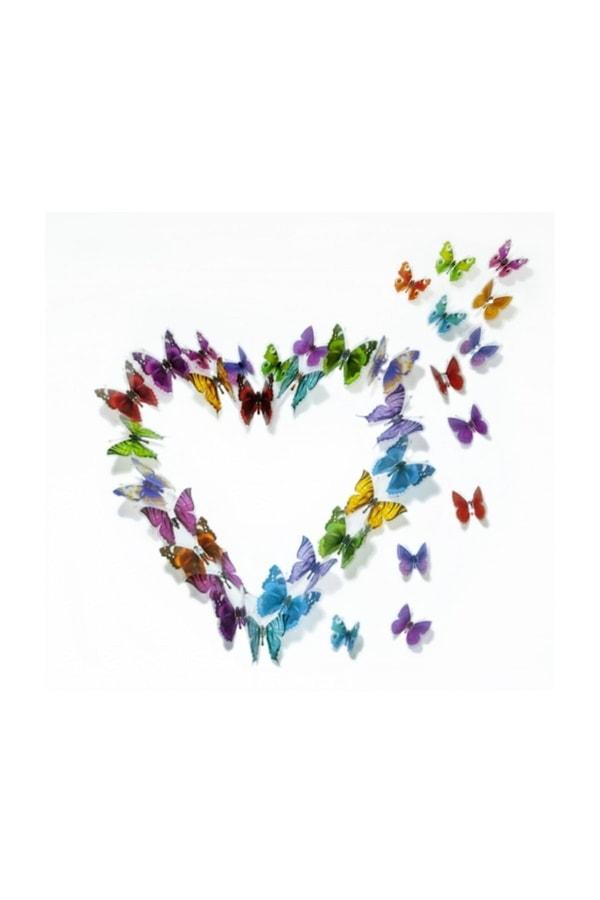 17. Uçuşan kelebeklerin olduğu rengarenk bir duvar süsü. 😍