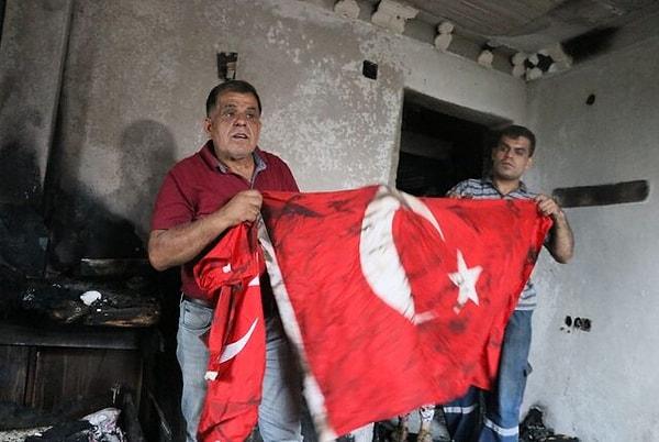 Çekmecede duran Türk bayrakları ise zarar görmedi