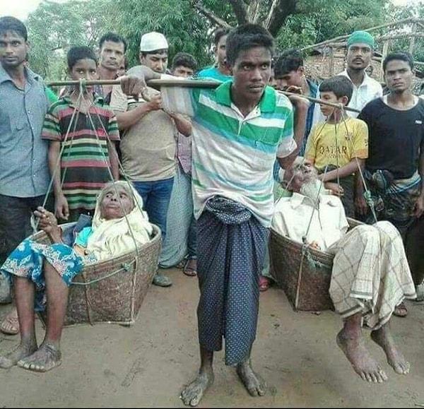 6. Bangladeş'teki zulümden kaçarken yürüyemeyen annesi ve babasını geride bırakmayarak onları 160 km sırtında taşıyan evlat gibi evlat.