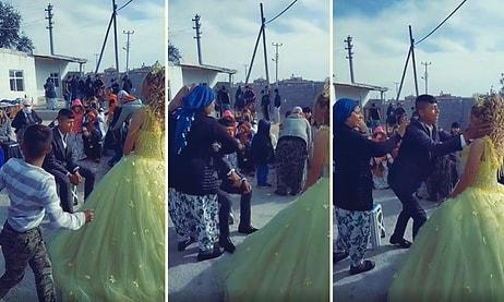 Yaşınız Kaç Sizin Evleniyorsunuz? Düğün Sırasında Bir Kadın Tarafından Oturduğu Yerden Kaldırılan Damadın Bir Garip Görüntüleri