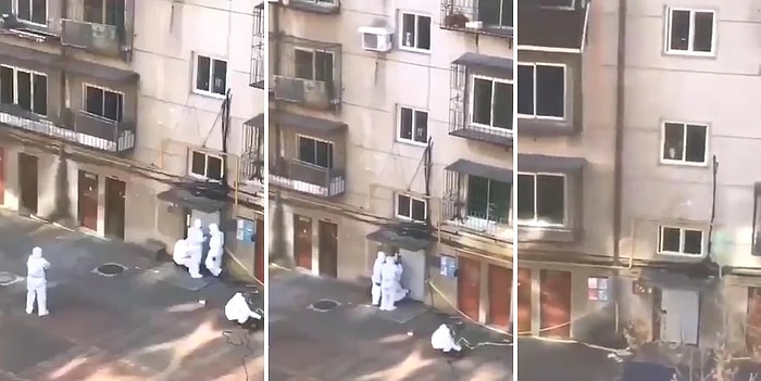 Çin'de Koronavirüs Testi Pozitif Çıkan İnsanların Yaşadıkları Binaların Kapılarına Kilit Vuruluyor