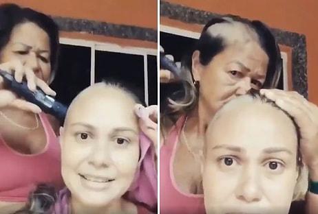 Kanser Tedavisi Göre Kızının Saçlarını Kazırken Kendi Saçlarını da Kazıyarak Kızına Desteğini Gösteren Anne