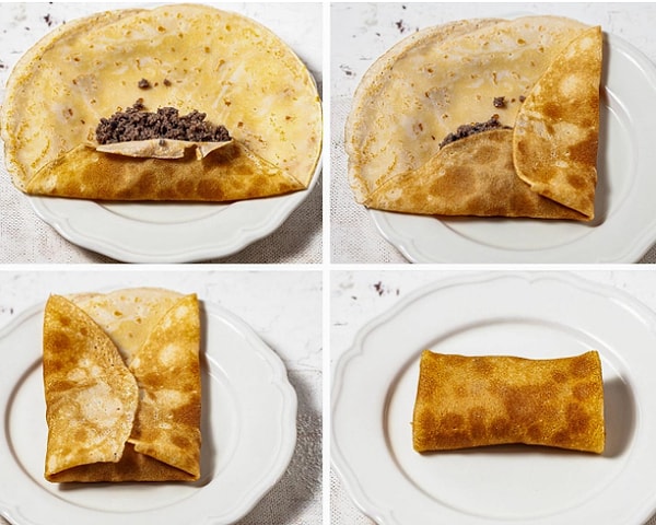 9. Заверните начинку внутрь блинов, формируя небольшие конвертики. Это еще не все!