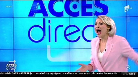 Romanyalı Sunucu Canlı Yayında Çıplak Bir Kadının Saldırısına Uğradı!