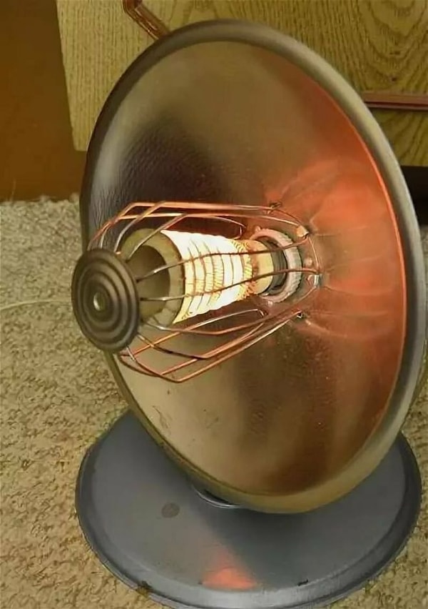 6. А это фото домашнего обогревателя с отражателем тепла