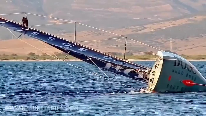 Jack Sparrow İşine Bak Kardeşim: Yan Yatan Yelkenlinin Üzerinde Takım Elbisesi ile Şov Yapan Adam