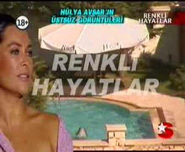 2. Hülya Avşar'ın havuzda üstsüz bir şekilde spor yaparken paparazzilere yakalanması