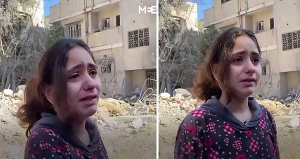 10 yaşında dünya güzeli ve iyisi Filistinli bir kız yıkılan binalarının önünde ağlayarak “Çocuklara neden füze atıyorsunuz? Bu adil değil!” diyor.