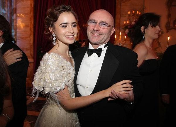 4-Lilly Collins ve Phil Collins