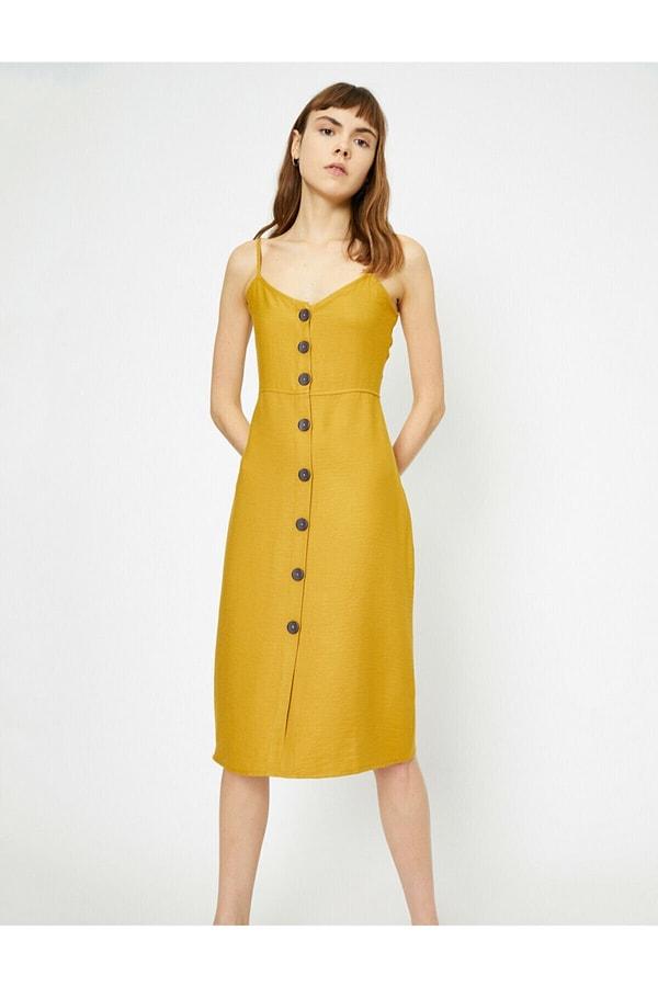 14. Sarı ve düğmeli elbise