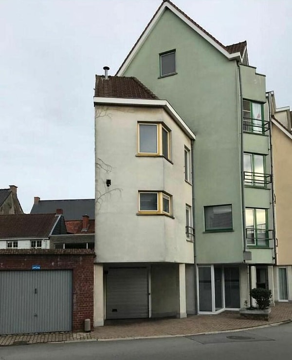 8. Этот дом похож на многоярусный торт, который разрезали пополам