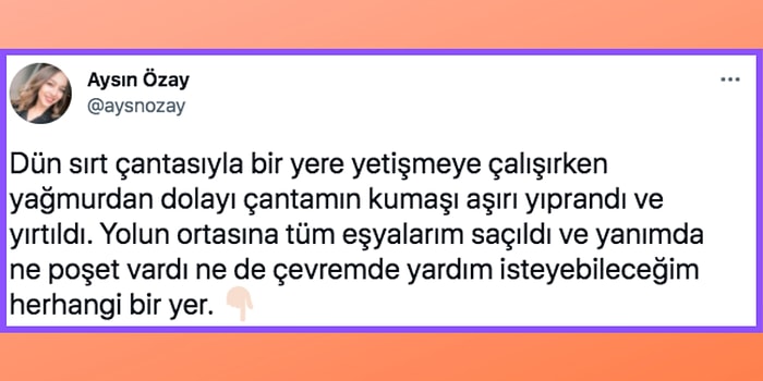 Yağmur Nedeniyle Çantası Yırtılan Kadının Bir Apartmanın Önünde Yaşadığı Karşılaşma İçinizi Isıtacak!