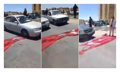 Libya'da Türk Bayrağını Yere Serip Araçlarla Üzerinden Geçtiler