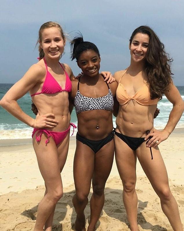 19. Vücutlarının ne kadar kaslı olduğunu gösteren olimpik jimnastikçiler: