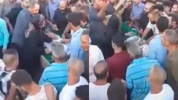 Sosyal medyada yayınlanan görüntülerde, bir kadının ağlayarak "cesede" dokunduğu, açık tabutun etrafında toplanan kalabalığın ise yas tuttuğu görülüyor.