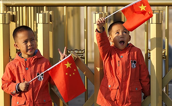 В Китае официально разрешили иметь троих детей