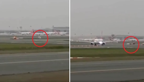 İstanbul Havalimanında Şiddetli Rüzgarın THY Uçağına Doğru Sürüklediği Parçayı Bloklayan Yer Görevlisi