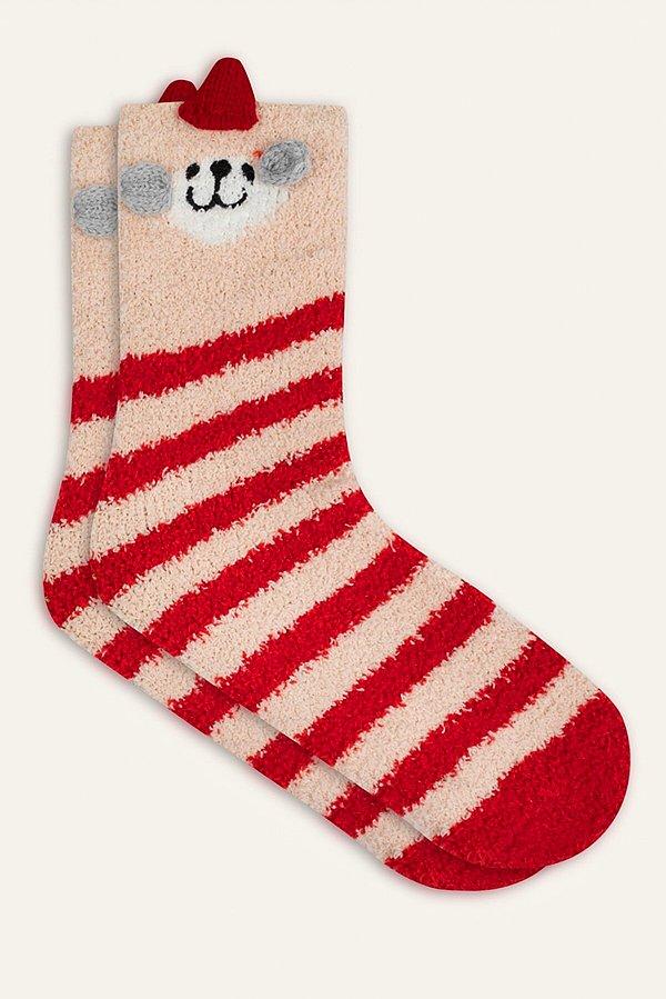 7. Mudo çoraplar ile yeni yılda da sıcak ve şık olabilirsiniz.