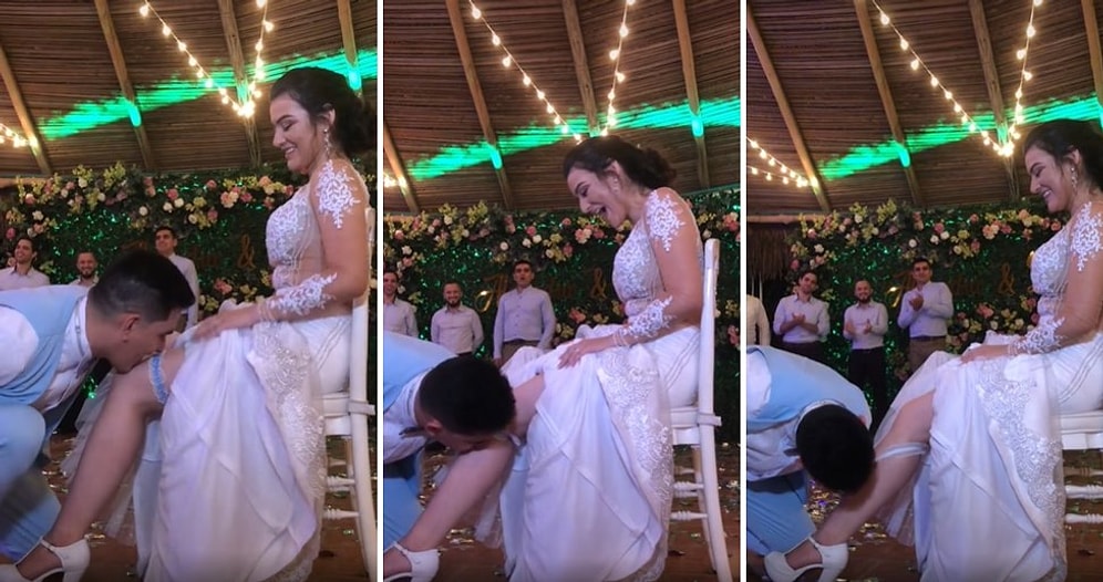 Bu Nerenin Geleneği? Düğünde, Gelinin Bacağındaki Bacak Bandını Ağzıyla Çıkarmaya Çalışan Damat