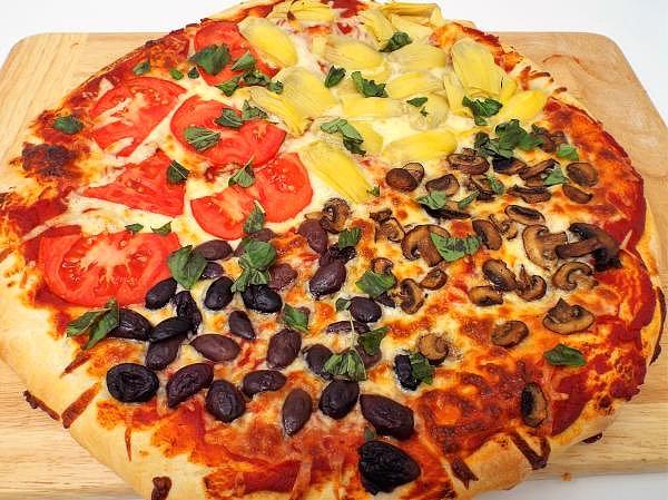 12. İtalya- Pizza quattro stagioni (dört mevsim pizzası)