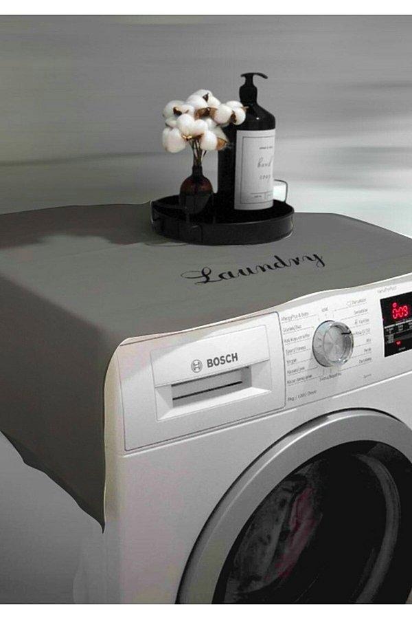 1. Demode çamaşır makinesi örtülerini rafa kaldırıyoruz.