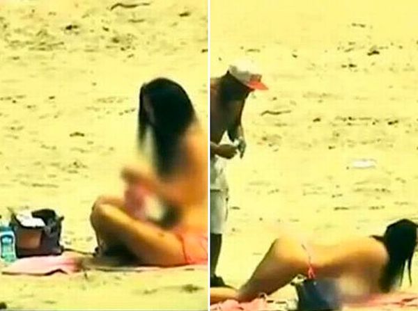 Bikinisinin üzerini çıkararak güneşlenmeye başlayan kadını uzaktan da bir kamera kaydediyor.