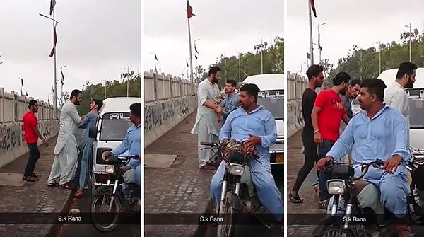 O motosikletli kişi bir anda kasıklarından horoz çıkartarak kavgayı görüntüsünün önüne geçiyor!