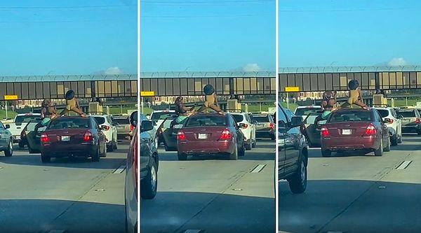 ABD'nin Teksas eyaletine bağlı Houston şehrinde kaydedilen görüntülerde, yoğun trafik nedeniyle bunalan kadınlar aracın üzerine çıkarak twerk yaptılar.